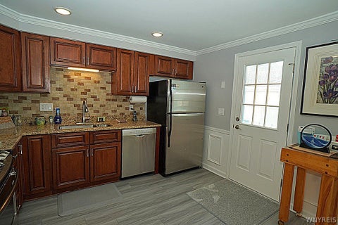 Tiny photo for 21 The Common Cmn, Lockport City, NY 14094 (MLS # B1724114)