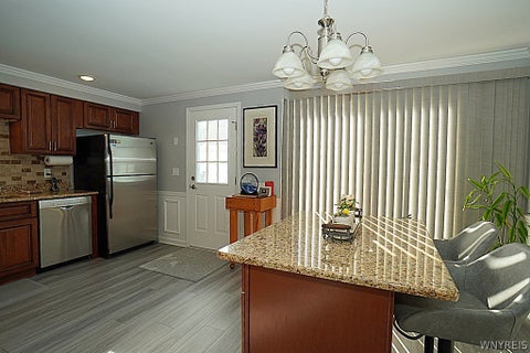 Tiny photo for 21 The Common Cmn, Lockport City, NY 14094 (MLS # B1724114)