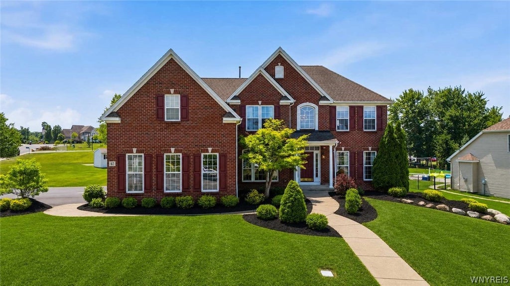 Photo of 67 Breezewood Drive, Orchard Park, NY 14127 (MLS # B1696884)