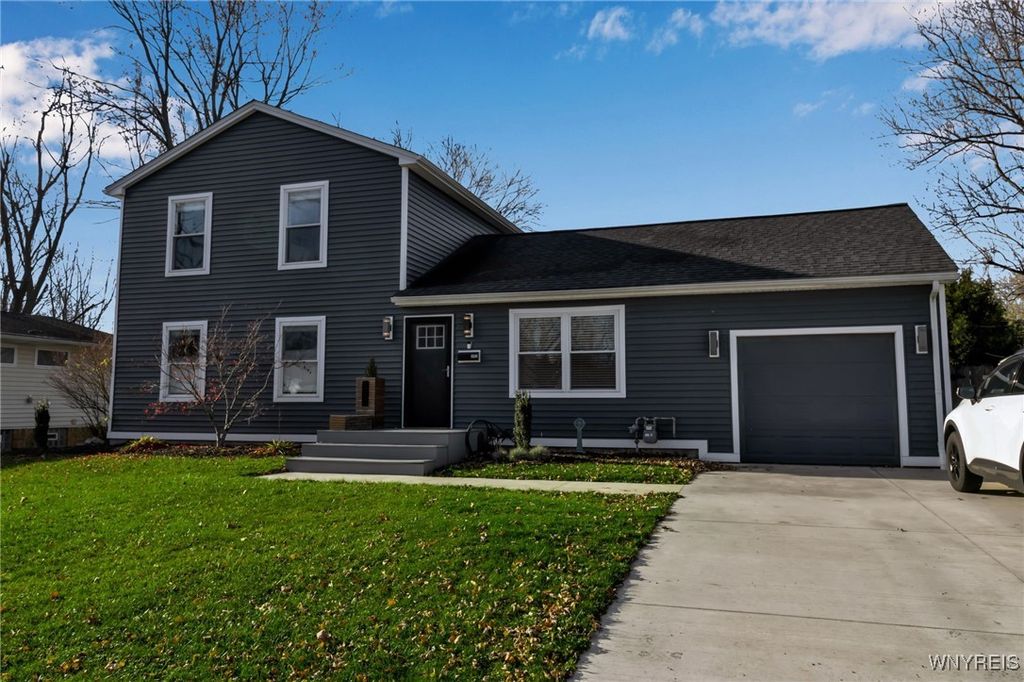 Photo of 302 Brookwood Drive, Hamburg, NY 14075 (MLS # B1652232)