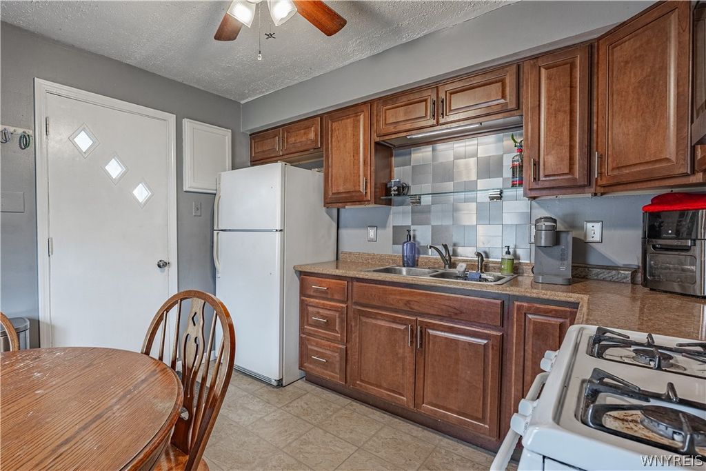 Photo of 4368 Crescent Drive, Niagara Falls, NY 14305 (MLS # B1669479)