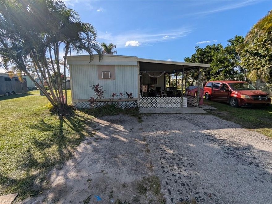 Manufactured home with income potential on an oversized and very beautiful lot in great location.