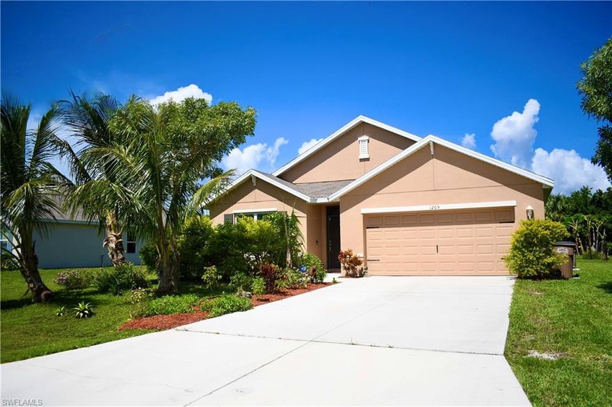 Beautiful 4 Bdrm/2 Bath home in SW Cape Coral!  Situated in a highly sought after area of Cape Coral, this D.R. Horton Cali model is only 4 years old and features a great room layout, tile flooring throughout with carpet in the bedrooms, and a spacious kitchen with walk-in pantry.  Seller has added some decorative touches to the kitchen including a mosaic tile backsplash and wood paneling to the front of the kitchen island.  A 10ft x 30ft screened in patio was just added in 2019 and includes a 7x7 hardwired jacuzzi which conveys with the sale of the home.  The spacious backyard is fully fenced with tons of fruit trees (avocado, mango, papaya, bananas & coconuts), a beautiful wood pergola and a koi pond/water feature with fountain. Although connected to city water & sewer (assessments are fully paid), the property has it's own well for irrigation. One of the best features of this property is the location.  The rear property line is adjacent to a multi-acre property (Saddlewood Farms community) and offers lots of privacy!  Tucked away in a nice quiet neighborhood, but close to Pine Island Rd and Veterans Pkwy with quick access to shopping, restaurants, Matlacha & Fort Myers!