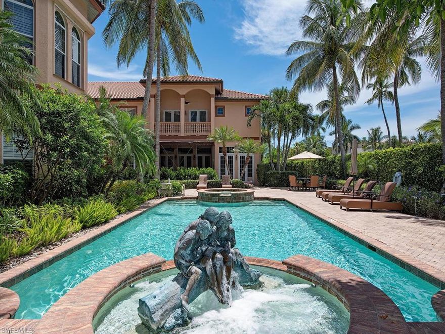 Highly sought after Old Naples downtown location.  Walk just three blocks to the white sand beaches.  Around the corner there is 5th Ave and 3rd St. with its shopping and world class dining.   With 3500 sq.ft on one floor, it's rare to find a condo this large . Beautifully updated, white kitchen with quartz counter tops, new 48" Wolf Range and open floorplan for entertaining.  Great room has high vaulted ceilings. Custom built ins, 2-car attached garage, tankless gas hot water heater,  generator, pet friendly.