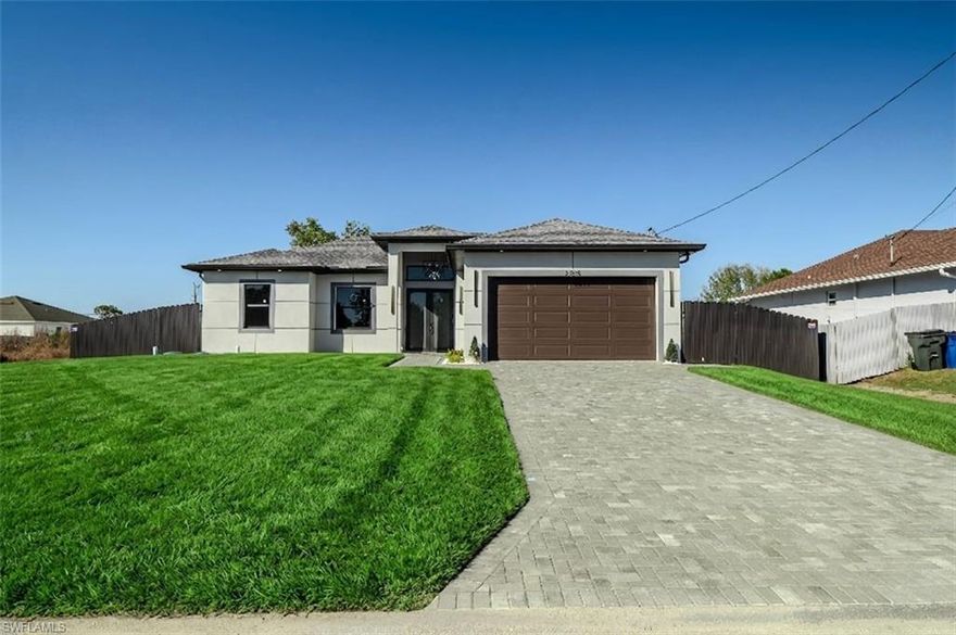 LOCATION !! Discover this spectacular NEW CONSTRUCTION home featuring 3 bedrooms, 2 bathrooms, and a 2-CAR GARAGE, designed with modern style and quality finishes in a peaceful neighborhood with NO HOA. The home offers a beautiful kitchen with STAINLESS STEEL APPLIANCES and a CENTER ISLAND with built-in microwave. The OPEN-CONCEPT LAYOUT provides a bright and functional living space, perfect for everyday living and entertaining. Enjoy a spacious LANAI WITH SUMMER KITCHEN, ideal for outdoor gatherings. Additional features include IMPACT-RESISTANT WINDOWS AND DOORS, METAL FENCE, IRRIGATION SYSTEM, and the property is NOT IN A FLOOD ZONE.