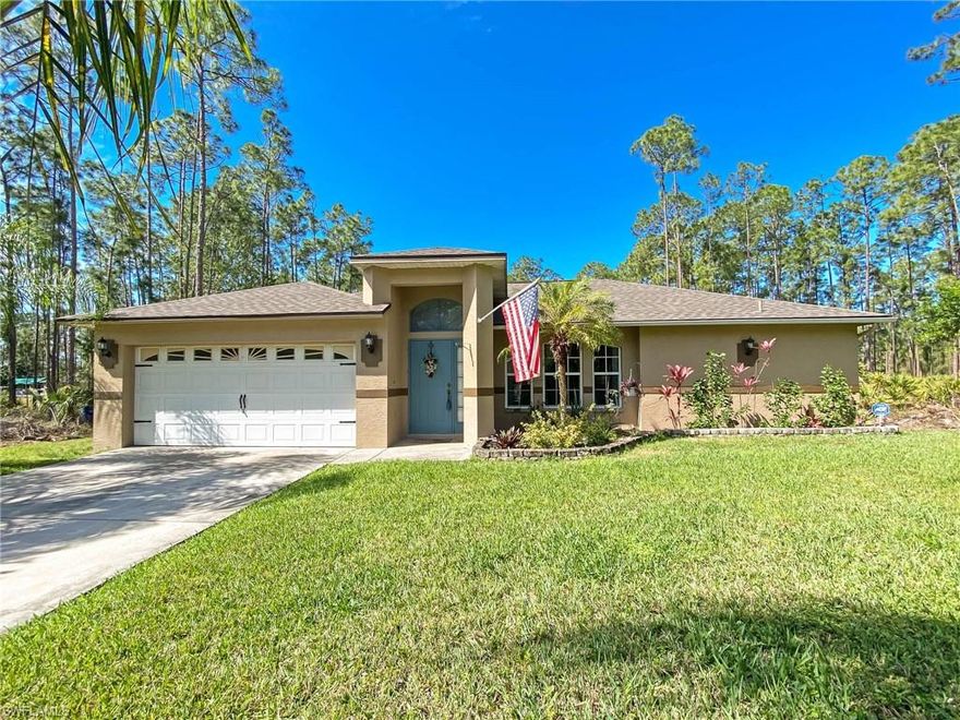 Beautiful 3/2 in  quite wooded neighborhood on a  dead end street.  This lovely home has a new roof and the interior has been freshly painted.  The back yard has a free standing 34x24 carport an engineered concreate slab floor suitable for parking an RV,boats etc.