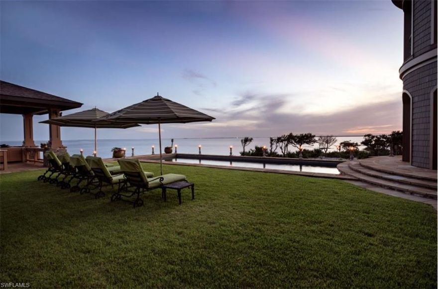 H3274 - Brilliantly orchestrated to capture stunning views of Pensacola Bay to the North and Santa Rosa Sound to the South, the main residence and a separate bonus studio/guest suite are crowned over 1.39 acres, allowing one to enjoy walking and fishing from their 1,000+ feet of beach and shoreline or take their boat out to the Gulf only minutes from their private dock. One can enjoy the passing of ships in and out of port and the sparkling lights of downtown shimmering on still night waters. Custom designed handrails adorn the 5,000 square feet of porches, as well as copper gutters, hand-selected Arkansas quarry stone, Rocky Mountain bronze hardware, and handcrafted Spanish Cedar shake dress the exterior. Additional features include GeoThermal HVAC, commercial-grade elevator, whole-house fire suppression system and generator, handcrafted Sycamore walls in the office, Pear walls in the formal dining room, a saltwater pool, coffered ceilings, non-slip Jurassic stone, Carrara polished countertops, 300-year-old reclaimed Pine flooring, at-home fitness center with steam shower, and so much more.