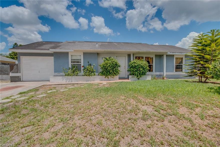 Sellers are installing a New Roof work tentative to begin approx. Aug 12 with a 5 year warranty!! Come view this great property in Golden gate City , make an appointment today to see your future home!  Great price and a great location for a starter family or a First Time Homebuyer!!! South of Golden Gate Parkway just around the corner from St. John Neumann High School. Nicely Proportioned Master Bedroom with walk-in closet and tiled shower. Recently painted inside and out. Huge fenced in backyard. Garage has been divided into a storage area and a AC work area. Can be converted back into a one car garage. All this and NO HOA fees!! One story single family residential home. House is completely tiled. Portion of the garage has been turned into a bonus room. The large backyard is completely fenced. Great home for pets! Make your appointment today!