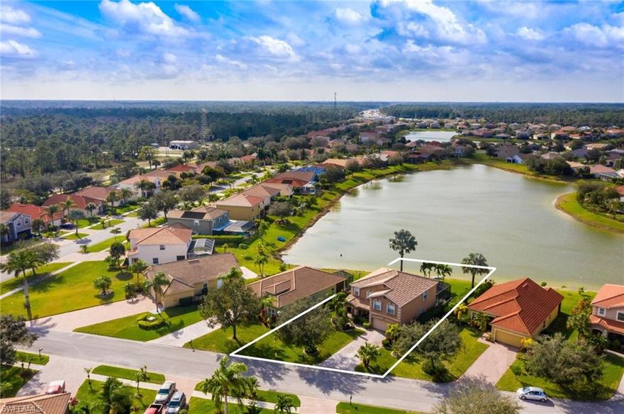 Prime Location!! Welcome to Valencia Lakes, one of Naples most desired communities in North Naples. This wonderful updated Two Story Single Family salt water Pool Home is situated in a Cul-De-Sac, features nearly  3,000 Sq. Ft of living space, brand new roof,  4 large  Bedrooms, Den/office, 2 Full  Bathrooms, half Bath & 2 car garage. French Main Doors leading to the formal dining room, formal living room, family room, kitchen nook,  new stainless steel appliances, kitchen island, reverse osmosis system, newer light fixtures,  washer and dryer, crown molding, excellent natural light. Spacious Master Bedroom with sitting area. Master Bath has dual sinks,  walk-in-shower, large tub and 2 big walk-in closet, tile and laminated wood flooring in all living areas . Step out through the sliders doors  to the pool with the oversize screened lanai with vast views of the lake, beautiful landscaping around the home, rated A schools, Publix, CVS Pharmacy . Valencia Lakes is a friendly and active community with very low HOA fees! Updated clubhouse with billiard room, library, fitness, resort style pool and spa, playground and tennis courts. Easy access to I-75 and only ten miles to the Beach!