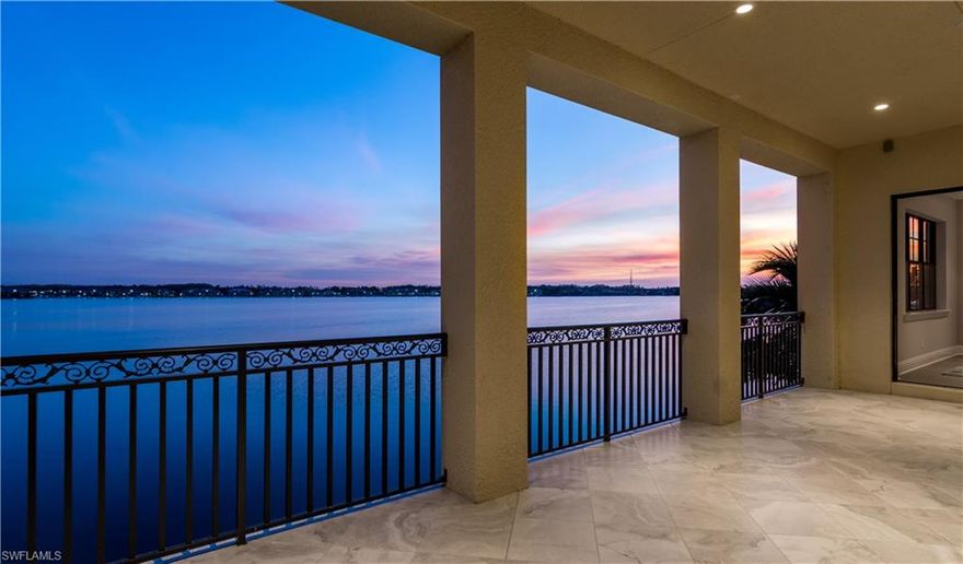 A Water View out of every Window!!  Breathtaking water views abound in this luxurious, private end-unit condo with 3 bedrooms, 3 full bathrooms, and 2 car garage. Welcome the sun on your expansive lanai and end the day with colorful sunsets from your bedroom balcony. Natural light flows through custom glass kitchen cabinets with peek a boo exterior views. Prepare gourmet meals utilizing state-of-the-art Sub-Zero refrigerator, Wolf range, oven, and Miele dishwasher.  Custom wood floors throughout the main living area and master suite are sure to delight. Remarkable master bath en-suite features separate glass shower enclosure and soaking tub overlooking Lake Como. Ravenna residents enjoy exclusive use of the private community pool and clubhouse with boat docks available for lease. Located within the Miromar Lakes Beach and Golf Club, the #1 gated community in the U.S., additional amenities include 3 miles of walking beach, 700 acres of freshwater lakes, sailing, skiing & other water sports, a private community pool, spa & fitness center, 2 restaurants, bocce ball, tennis, and more. Live the Florida resort lifestyle!