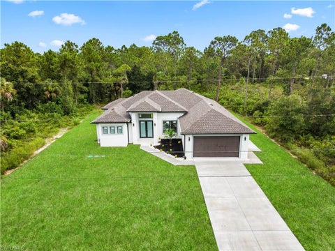 Photo of 1110 Rush AVE, LEHIGH ACRES, FL 33972 (MLS # 226028481)