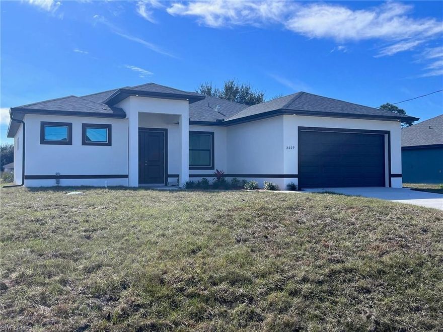 Spectacular New Casariego Development 4 bed/2.5 bath with 2 car garage & an oversized driveway. Located in a prime location of LEHIGH ACRES!  This Open concept home features high ceilings, 8FT interior doors, Impact-resistant doors and windows, porcelain flooring throughout. The gourmet kitchen features a quartz two-waterfall island, stainless steel appliances, and custom made cabinets. The master suite boasts walk-in closets and a spa-like bath with a glass-enclosed shower and dual quartz vanities. Lease with option to buy