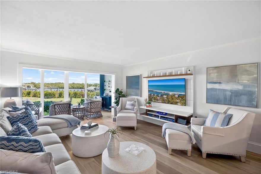 Discover effortless coastal living in this charming 2-bedroom, 2-bathroom waterfront residence. Located in the highly sought after Mariner’s Cove community, this rarely available, first floor offering is fully furnished and move-in ready. Perfectly blending modern elegance with serene waterfront charm, this property offers an exceptional lifestyle just minutes from vibrant downtown Naples and the Gulf beaches. Inside, this unit shines with an abundance of natural light streaming through an expansive wall of impact-resistant sliding glass doors. Enjoy stunning and private views of the Gordon River and spectacular sunrises, with your own deeded boat slip just steps away, offering direct Gulf access. This unit has been impeccably updated and tastefully styled with high-end finishes and furnishings throughout. The open concept floorplan is spacious and inviting. The primary suite offers gorgeous water views, a generous walk-in closet, and an updated bathroom with walk-in shower. Mariner’s Cove amenities include a community pool, scenic waterfront BBQ area, covered carport, fishing pier, storage areas and more. Experience the best of Naples right outside your door. This location offers unparalleled walkability, placing you just a short stroll from the vibrant energy of Bayfront, the historic charm of Tin City, the world-class dining and upscale boutiques of Fifth Avenue South and Third Street, and the exceptional sugar sand Naples beaches. Walk to Gulfshore Playhouse, Baker Park, the revitalized Arts District and so much more! Set up your private showing today.