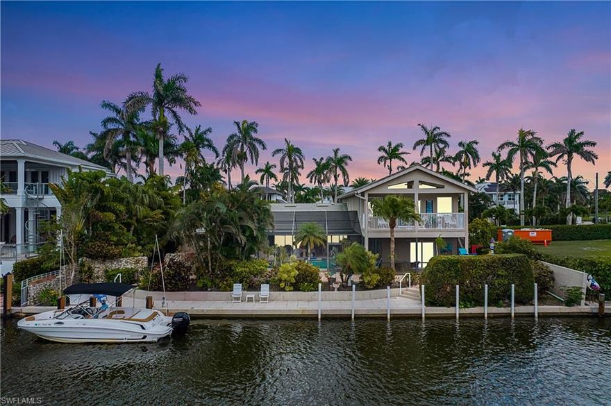 Experience the ultimate waterfront living and endless possibilities with this exceptional property located in the highly sought-after boater's paradise of Aqualane Shores. Perfectly situated in the heart of Olde Naples, this corner "tip" lot offers awe-inspiring and unobstructed panoramic views of the Naples Bay that will take your breath away. This rare gem features an impressive 100 feet of seawall and provides quick and easy access to the Naples Bay and the Gulf of Mexico, making it an absolute haven for any boating or fishing enthusiast. Just a short walk or bike ride away from the vibrant 3rd Street shops and restaurants, and a little further to Naples' world-renowned white sandy beaches. This quaint and spacious home is currently “move-in ready”. Capitalize on the opportunity to customize the home's interiors for yourself, use it as an investment property (a separate upstairs apartment provides additional options) or build an exquisite dream home on one of the most prestigious lots in Aqualane Shores. Don't miss out on your chance to own this unforgettable waterfront property and all the endless possibilities it has to offer.