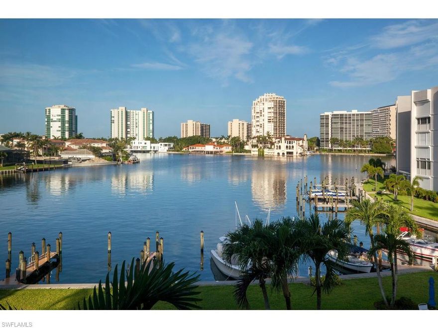 C.15264  This is the perfect waterfront residence. One of the few pet friendly buildings. 4th floor 3-bedroom 3-bath end unit with unobstructed views of Venetian Bay.  Wake up to this same spectacular view from all three bedrooms. Enjoy seeing the dolphins play while watching magnificent sunsets on the large screened lanai. Third bedroom is currently used as a den. Only 29 residences. Colony Gardens has expansive grounds and one of the lowest densities in Park Shore. Steps to Venetian Village shops and restaurants. Private beach access available with Park Shore H.O.A. membership. A deeded boat dock is included.