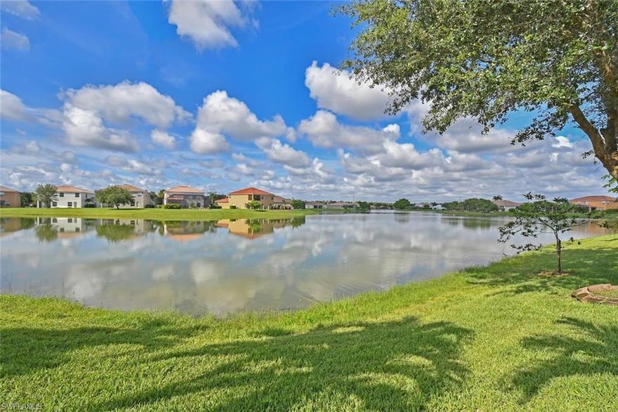 PANORAMIC LAKE AND WILDLIFE VIEWS!  Recline poolside and enjoy a refreshing beverage as you gaze out over sparkling waters and picturesque sunsets while you relax and unwind from the day’s activities.  Large screened patio offers the perfect venue for gathering and entertaining with family and friends!  This open and airy lakefront home is the popular “York” 4 BD, 2 BA floor plan and features a long list of upgrades and appointments including a new A/C (2/17), plantation shutters, full exterior gutters, newer Stainless Steel kitchen appliances, hurricane shutters, retractable porch awning, heated pool and more!  Versatility abounds with this beautiful single story home with 3-car garage and long paver stone driveway.  For the recreational enthusiast, low monthly dues of $142.25 include cable, clubhouse, tennis, resort style community pool, basketball, pier, exercise room, game room, playground and more!  The Florida lifestyle awaits you…………..