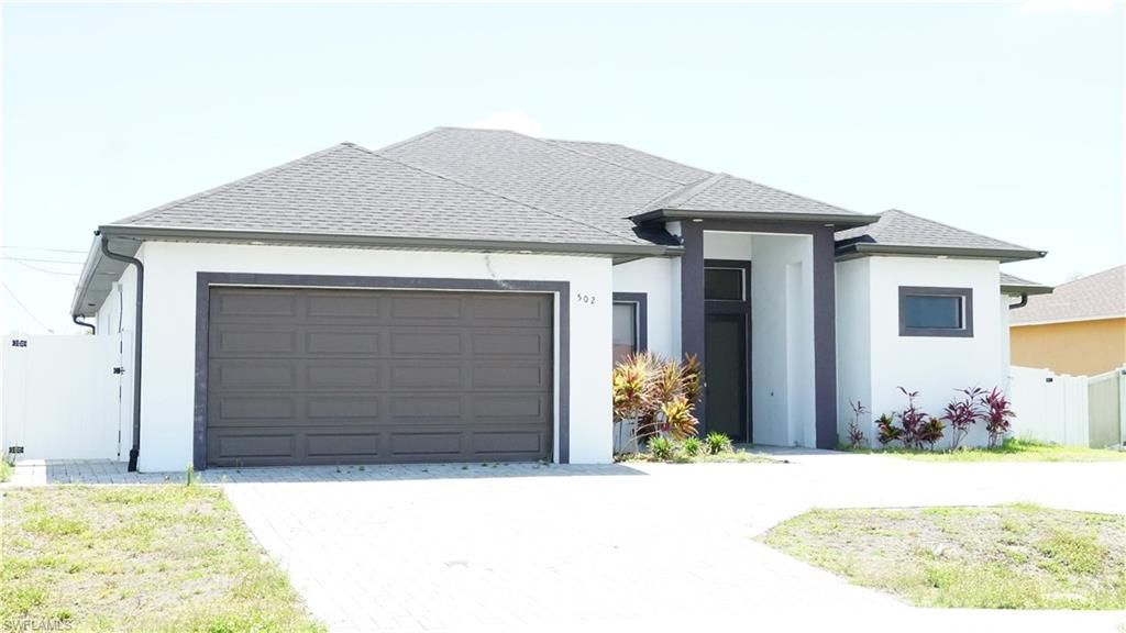 Photo of 502 Tropicana PKWY W, CAPE CORAL, FL 33993 (MLS # 226017264)