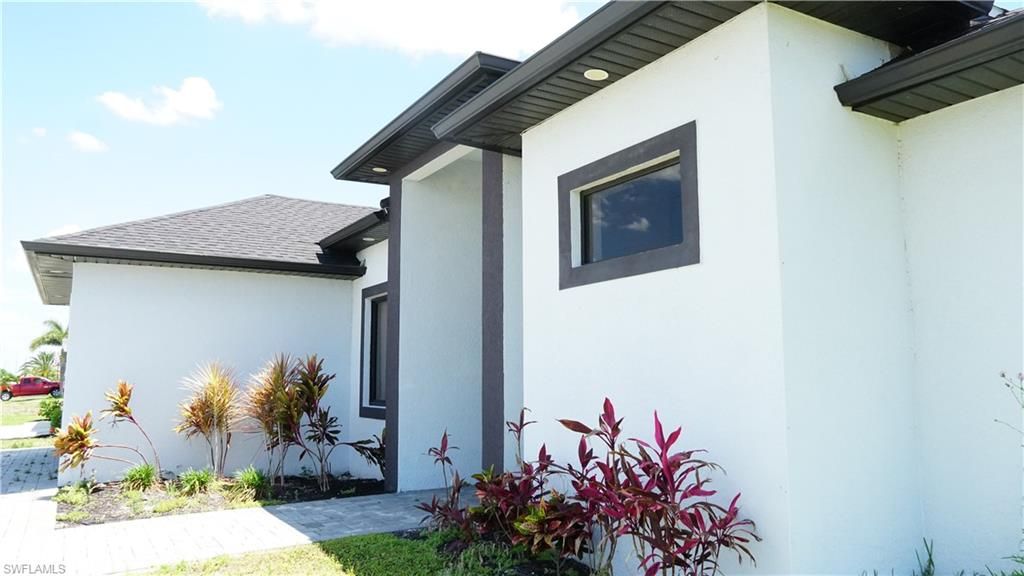 Photo of 502 Tropicana PKWY W, CAPE CORAL, FL 33993 (MLS # 226017264)