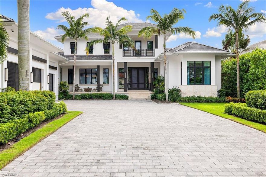 This impeccable, private residence is near the beach on North Lake Drive. Designed by Falconer Jones III and executed by BBa Development, the residence features custom interior design and finishes by Lisa Ficarra. The six-bedroom, nine-bath home boasts 8,093 square feet and sits lakeside on an oversized lot with .52 acres. Thoughtful design features include Ludowici clay tile roof, Legno Bastone wide-plank flooring, gourmet kitchen with butler’s pantry and outdoor coral stone throughout the property. An expansive outdoor entertaining space flows into an inviting pool and spa area, overlooking the picturesque lake and lush landscaping. The property is conveniently just minutes from the highly anticipated new Four Seasons Beach Club, and shops and dining on Fifth Avenue and 3rd Street.