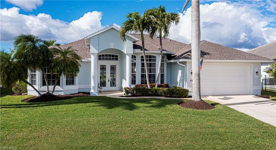 PRICED BELOW MARKET | MOTIVATED SELLER |Gulf Access Pool Home | Roof - 2018 | Gutters - 2023 | AC - 2018 | Pool Cage - 2023 | Pool Pump - 2023 | Pool Heater - 2019 | Seawall - 2018 | Fence - 2022 | Exterior Paint - 2023. Welcome to this charming 2,000+ SF, 3-bedroom, 2-bathroom home, is in a well-established SW area of Cape Coral. The new owners will enjoy western exposure, providing breathtaking sunsets. The large kitchen offers abundant cabinetry and counter space, a walk-in pantry, and a breakfast nook with sliders providing pool access. The open concept floor plan features vaulted ceilings, a centrally located family room, a formal dining room, and 8' sliders leading to the waterfront lanai and pool: all ideal for entertaining. The large master suite offers walk-in closets, a standalone shower, a soaking tub, and a patio door overlooking the pool and canal. Bedrooms 2 and 3 are private, and perfectly positioned, with access to the well appointed pool bath. 
This is Florida living at its BEST!