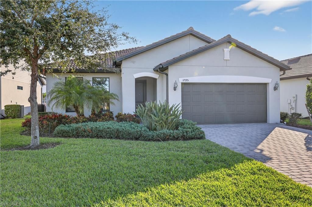 Photo of 17195 Hadlow PL, FORT MYERS, FL 33967 (MLS # 226003523)