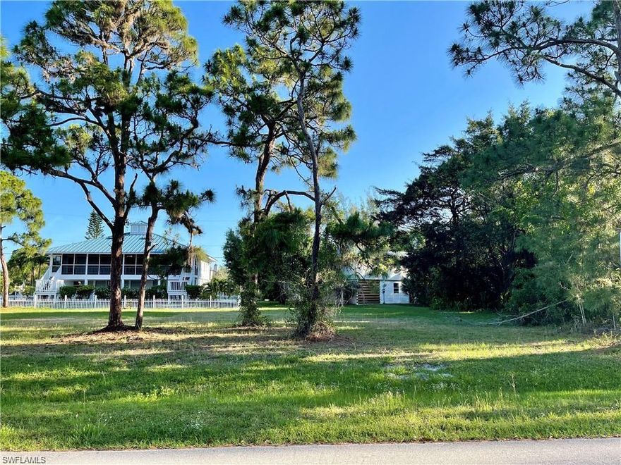 The perfect spot to build your dream home! On the north end of Pine Island with easy access to Capt'n Con's Fish House, The Lazy Flamingo, and Four Winds Marina on Charlotte Harbor. Captain's Cove is a great community with a community boat ramp, so you get all of the amenities without any of the extra hassle. The community also has a private sewer system, so there is no need to worry about getting your own septic tank. Come enjoy the island lifestyle today!