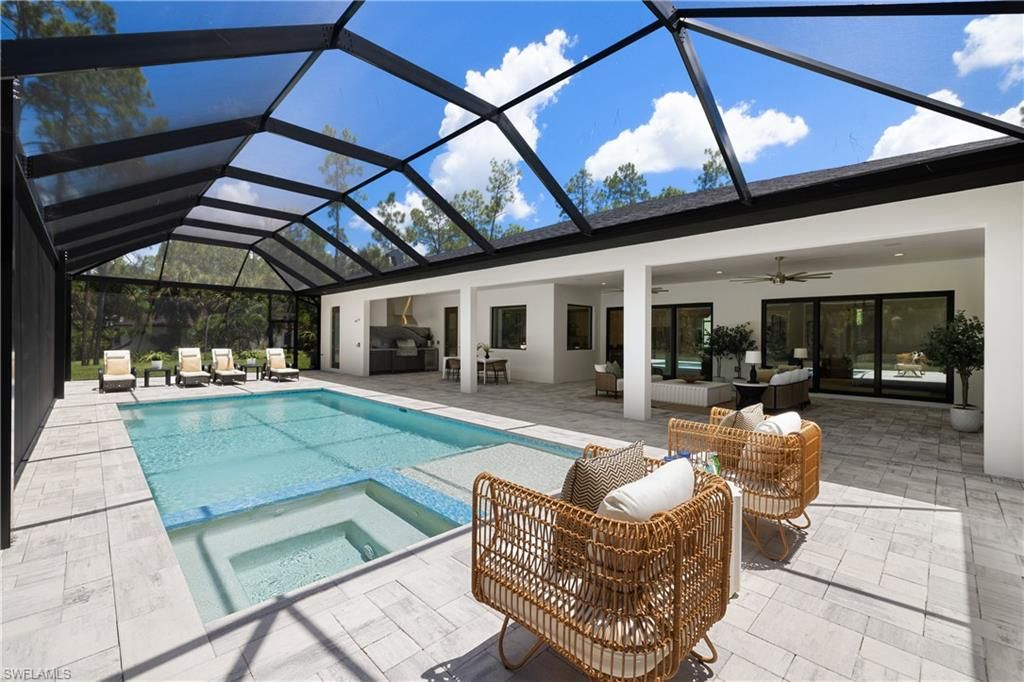 Photo of 4221 7th AVE NW, NAPLES, FL 34119 (MLS # 226018661)