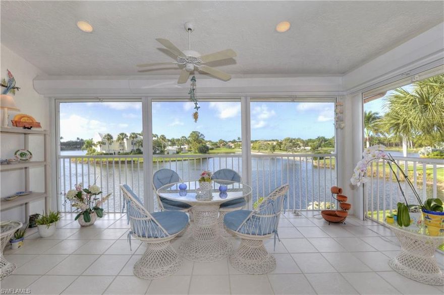 Southwest exposure from this spacious 3 bedroom + den and 3 full bath coach home with nearly 2,300 sq. ft. under A/C! This popular floor plan features panoramic lake views from the open living room, master bedroom and large screened lanai. Additional features include: Private elevator, electric storm shutters, attached garage, community tennis courts, community pool/spa, private clubhouse and much more.   
                                         
Windstar offers incredible amenities including: Tom Fazio designed golf course, clubhouse with spectacular views of Naples Bay, 73 slip deep-water marina with direct Gulf access in less than ten minutes, clay tennis courts, fitness center, Keewaydin Island Beach Club with boat shuttle and private membership.