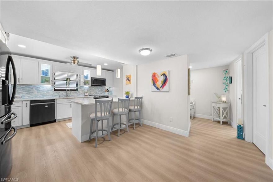 TURNKEY FURNISHED, BOAT DOCK AND WATER VIEWS! Discover the ultimate waterfront condo for sale on Marco Island. A true boater’s paradise located in the highly desirable South Island neighborhood. This luxurious fifth-floor Gulf-access condominium offers quick direct boating access to the Gulf of Mexico and includes your own private boat dock, making it ideal for boating enthusiasts and luxury buyers seeking premium coastal living. Featuring 2 bedrooms, 2.5 baths, and 1,800 sq. ft. of beautifully designed living space, this Marco Island waterfront condo blends comfort, elegance, and breathtaking water views from every room. Large impact-resistant windows and sliders flood the home with natural light and creates the perfect indoor-outdoor living experience overlooking the tranquil canal. The gourmet kitchen offers shaker-style cabinetry, a breakfast bar, and new appliances, including a French door refrigerator. The spacious owner’s suite opens to a wrap-around balcony and features panoramic water views, along with a luxurious en-suite bath complete with a vanity and glass-enclosed walk-in shower. The private guest bedroom also includes its own balcony and adjacent full bath. Additional highlights include a laundry room with cabinetry and front load washer/dryer, luxury vinyl flooring and a covered parking space. Tropical Isles is one of Marco Island’s most desirable low-density communities, offering top-tier amenities such as a heated pool, fitness center, community room, hobby room, rentable kayak racks, a library, and ample covered parking with bike racks. Situated on a quiet cul-de-sac, this condo is less than one mile from South Beach access and close to world-class dining, shopping, entertainment, mini golf, a movie theater, and the island’s executive airport. If you’re searching for a Marco Island condo with direct Gulf access, private dock, and resort-style amenities, this exceptional waterfront residence delivers the best of the Florida lifestyle, luxury, convenience, and unmatched coastal living.