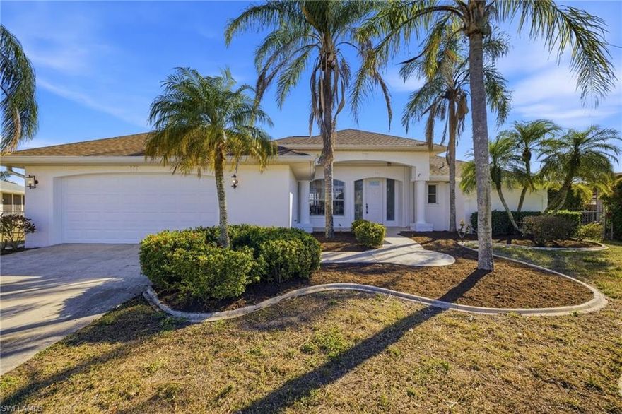 Located in one of the area’s most desirable boating neighborhoods, this beautifully maintained waterfront home offers direct sailboat Gulf access and a short, effortless ride to open water — delivering the very best of the Southwest Florida lifestyle.

Southern rear exposure fills the home with natural light and keeps the pool sunny throughout the day. Soaring ceilings and an open, airy layout create an immediate sense of space, while expansive sliding glass doors draw your eye straight to the water. Indoor and outdoor living blend seamlessly across the oversized screened lanai.

An updated kitchen anchors the main living area with shaker-style cabinetry, granite countertops, recessed lighting, and a breakfast bar perfect for gathering. The bright breakfast nook wrapped in windows overlooks the pool and canal, keeping the view front and center. A gas fireplace adds warmth and character to the great room.

Retreat to the primary suite, where vaulted ceilings and direct lanai access enhance the waterfront feel. The bath was tastefully updated and features dual vanities, a freestanding soaking tub, and a walk-in shower. Guest bedrooms are comfortably sized and thoughtfully positioned for privacy.

Outdoor living truly sets this home apart. A 60-foot-wide covered lanai spans the full width of the house, opening to a generous stamped concrete deck and sparkling heated oversized pool. Long canal views stretch down the waterway, creating an expansive and peaceful backdrop. A private composite dock and slip provide direct, no-bridge boating access with less than two miles to open water.

From your backyard, explore the waters leading toward Sanibel and Captiva Islands, enjoy waterfront dining by boat, or take advantage of some of Southwest Florida’s renowned inshore fishing grounds — all within easy reach.

Additional features include a dedicated pool bath, oversized garage, spacious laundry room with extra cabinetry and utility sink, hurricane shutters, a 2019 roof, and fresh interior and exterior paint. Offered turnkey for convenience and peace of mind, the property has never flooded.

Sunsets on the water, quick access to the Gulf, and one of SW Cape’s most established boating locations — this is waterfront living done right. Take a look!