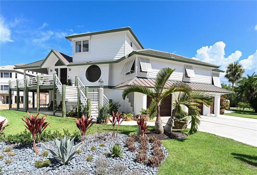 The Coastal Island style Barefoot Beach home is just steps from the white sand & turquoise water of the Gulf of Mexico and features 4 bedrooms 3.5 baths, a large master suit with private den/office, kitchen, dining, great room with coral rock fireplace that leads to a large outdoor deck to enjoy views of the Gulf and sunsets. The deck will also over look the new 1,000 sq foot swimming pool with sun shelf, spa, fire pit and large deck and all new tropical landscaping plus walkway from house to the pool and Gulf. All costs associated with the new pool, landscaping and common area amenities have been paid by the Seller. Barefoot Beach homes amenities include guard gated entrance with 24 hour guard patrols, lighted tennis courts, pickleball courts, clubhouse with fitness and events rooms all in the quarterly fee of $2,845. Boat docks are available for purchase and or possible lease across the street with direct no bridges Gulf access. But best of all this is the lowest priced single family Gulf of Mexico Beach home in Collier County! Furnishings are negotiable and quick closings are ok to allow the Buyer to enjoy all of this season.