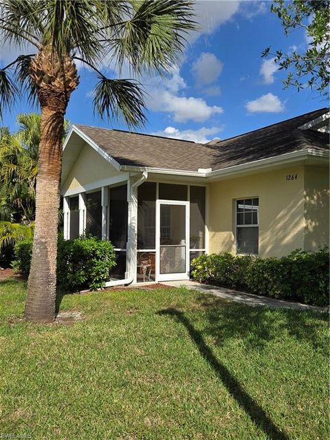 Photo of 1264 Red Oak LN, PORT CHARLOTTE, FL 33948 (MLS # 226016083)