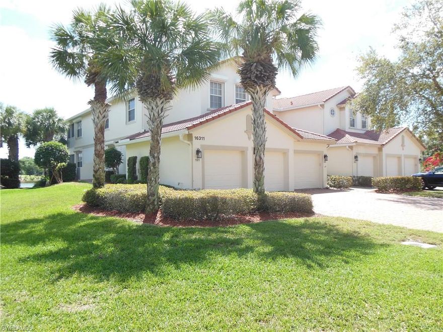 ONE OF THE BEST VIEWS IN CROWN COLONY! This beautiful eastern view features a lake, a golf course, a preserve and tons of bird watching! Located on the ground level with a spacious screened lanai and a 2 car garage. This condo has been lovingly maintained and has neutral decor throughout. The kitchen features upgraded cabinets, corian countertops with a breakfast bar, a pantry and a newer fridge & stove. New carpet in the bedrooms and tile in the remaining area. Unfurnished but mounted tv's stay.  Electric shutters on lanai for piece of mind during storm season with hand crank roll down shutters on all others. Crown Colony is 24 hour guard gated community and the golf is optional with a variety of memberships available. Your fees include community pool, spa, fitness and tennis center, X-1 cable and fiber optic internet, water and sewer, insurance on the building, lawn care and pest control. This community is located near Sanibel, Fort Myers Beach, shopping, dining and the hospital complex.