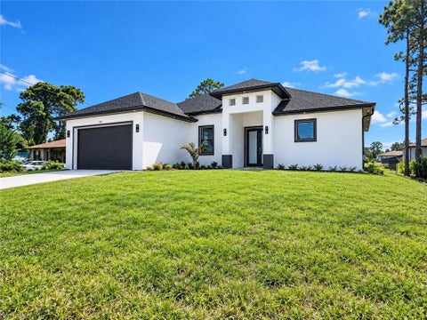 Photo of 3415 4th ST SW, LEHIGH ACRES, FL 33976 (MLS # 226037666)