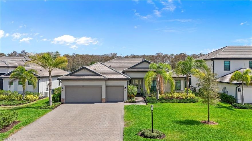 Rare Oakmont II Estate Home in Verdana Village - SELLER FINANCING AVAILABLE - NO FLOOD INSURANCE REQUIRED - FENCED IN YARD 
Don’t miss this exceptional opportunity to own one of only three Oakmont II Estate homes built in the highly desirable Verdana Village community. Built in 2023 by Lennar, this impressive residence offers stunning preserve views, abundant wildlife, and breathtaking sunset reflections that create a peaceful and private setting.
The spacious floor plan features 3 bedrooms plus a den/flex room (optional 4th bedroom), 2.5 baths, and a three-car insulated garage. Inside, the open-concept living area is designed to impress with a striking stone fireplace feature wall complete with an 85-inch TV, sound bar, custom wood shelving, porcelain hearth, and elegant wood coffered ceiling that creates a warm and sophisticated focal point.
The chef’s kitchen is ideal for entertaining, offering quartz countertops, tile backsplash, gas cooktop and oven, custom vent hood, and a large center island with seating for five. Designer lighting enhances the kitchen, breakfast area, dining space, and owner’s bath, while premium upgrades throughout the home include plantation shutters, crown molding, soaring ceilings, 8-foot interior doors, and tile flooring throughout with no carpet.
Enjoy seamless indoor-outdoor living with sliding glass doors that open to a spacious screened lanai with pavers, accessible from both the living area and breakfast nook, as well as private access from the owner’s suite. The extended paved patio and fully fenced backyard with a three-rail aluminum fence provide the perfect space for entertaining, relaxing, or accommodating pets while enjoying tranquil preserve views and beautiful Florida sunsets.
Verdana Village offers an unmatched resort-style lifestyle with world-class amenities including indoor and outdoor tennis and pickleball courts, indoor basketball, a state-of-the-art fitness center, yoga studio with classes, bocce courts, playground, green spaces, craft lounge, full-service restaurant, café, resort-style pool and spa, and indoor and outdoor dining with patio bar. The community is not located in a flood zone, eliminating the need for flood insurance.
Conveniently located next to Verdana Village are Publix, Dunkin’, a nail salon, UPS Store, hair salon, Legno Italian Restaurant, Fifth Third Bank, a dentist's office, and a new fire station with full EMS service. Nearby attractions include a winery and wedding venue, while Corkscrew Golf Club—open to the public—is just 1.5 miles away.
With new businesses continuing to develop in the area and a vibrant community atmosphere, Verdana Village has quickly become one of the most desirable places to live in Estero.
A truly rare opportunity to own one of the community’s most exclusive homes.