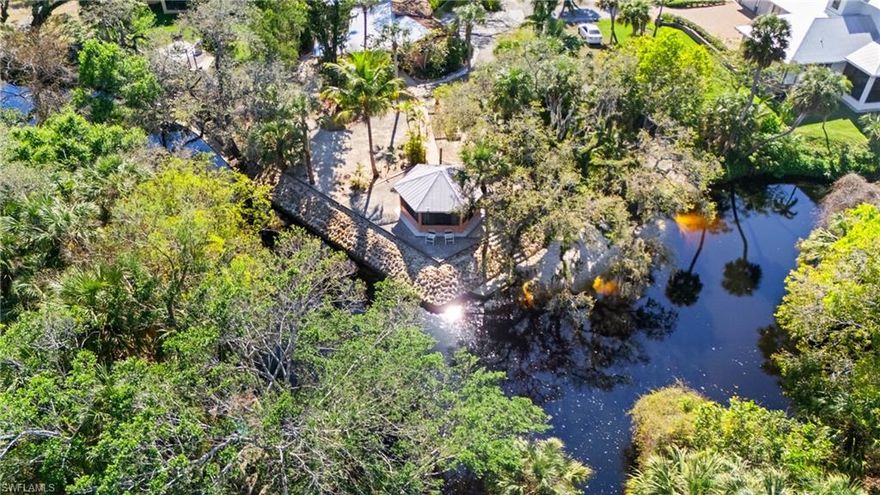 **Riverfront Paradise on the Imperial River – A Rare Gem!**  Welcome to your perfect slice of Florida paradise, nestled on the serene banks of the **Imperial River**! This stunning riverfront property is a dream come true for nature lovers, kayakers, boaters, and anyone seeking a peaceful retreat.  Unbeatable Location– Tucked away on a quiet dead-end street for ultimate privacy and tranquility and easily unload boat or craft. Breathtaking Views– Watch manatees glide by your gazebo in your backyard and enjoy the magic of filtered sunlight dancing through lush palm trees.  Versatile Living Space– The property includes a single-family residence and a rentable efficiency, offering income potential or space for guests. Endless Possibilities– Whether you embrace the existing home or design your custom dream home, this prime waterfront lot is the perfect foundation for your vision. Opportunities like this don’t come around often! Secure your piece of paradise today.