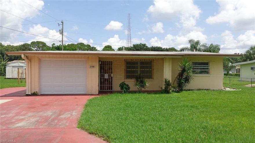 Great North Fort Myers neighborhood located off of 41. Close to the river, beaches, shopping, downtown and much more. Spacious yard. Extra parking space. Formal living room, family room, and dining room.