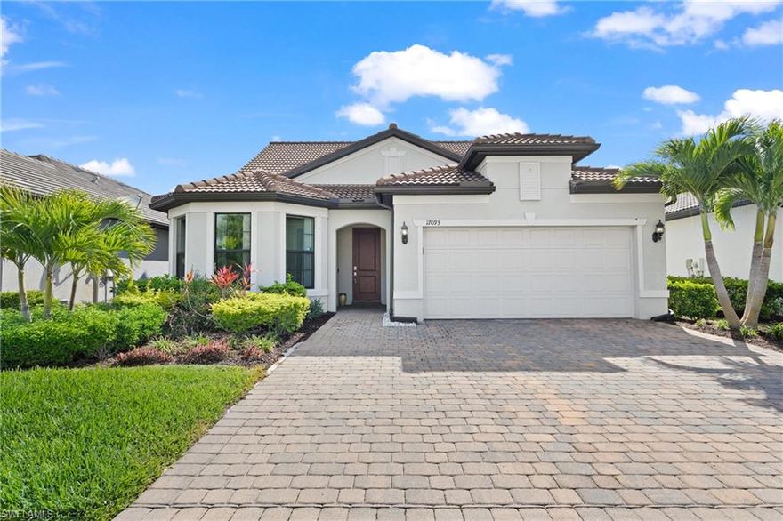 This home has it all. Built in 2020, this Summerwood floor plan has almost 2900 sqft and offers 3 bedrooms + an enclosed office, 3 bathrooms, a large loft area, 2.5 car garage (tandem), heated pool/spa, ample outdoor living space, and a private lot overlooking a beautifully maintained landscaped area. Upgrades include luxury vinyl plank flooring, white 42'' kitchen cabinets, white quartz counter tops, zero corner sliding glass doors, added tandem garage space, and more.  WESTBROOK is a gated community in South Fort Myers located off of Alico Rd and Three Oaks, just minutes to I-75, shopping and entertainment, FGCU, award winning beaches, RSW International Airport, and more. Low HOA fees and taxes. Amenities include a resort-style pool, fire pit, grills, fitness room, playground, clubhouse room, and more. NOT IN A FLOOD ZONE.