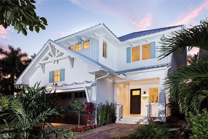 Introducing the Cottages Off Fifth, two luxury fully furnished single-family residences nestled along Park Street just steps to the famed 5th Avenue South Shopping and Dining District, the renowned tennis facilities of Cambier Park and the pristine beaches of Old Naples. Penned by MHK Architecture & Planning, constructed by Lotus Construction, LLC and masterfully appointed by Clive Daniel & Calusa Bay Designs, this 4-bedroom plus loft home offers a generously-sized interior with great room plan, ground floor master suite configuration and spectacular outdoor living space complete with private pool and spa, custom designed wet wall feature, fire pit, western exposure and lake view. Featuring “coastal cottage” design elements, this home will offer the finest in interior and exterior appointments. Construction features include CBS construction for first and second floors, Andersen impact windows, WolfSubzero appliances, custom Ruffino cabinetry, energy efficient spray-insulation, pre-wiring for custom shades, audio and security cameras, electric vehicle charger outlet in garage, natural gas feed. Please visit 770ParkStreet.com for more!