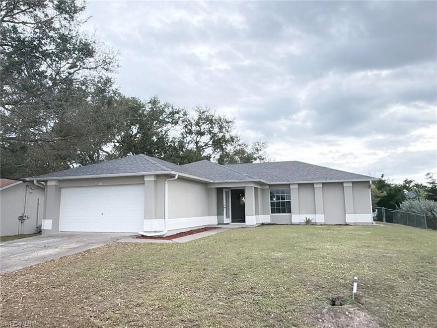Presenting 933 SW 7th Ave, a Charming 3BD/2BA home in SW Cape Coral! Conveniently located in a lovely neighborhood off Skyline Blvd near shopping, restaurants and entertainment. NOT IN A FLOOD ZONE AND CITY WATER, SEWER AND IRRIGATION ALREADY PAID! NEW ROOF IN 2022! Neutral tile & newer laminate flooring throughout. Bright and airy with a large great room and open floorplan. The spacious primary bedroom has an ensuite bath with a double sink vanity and a walk-in closet and shower. The two additional bedrooms are amply sized and could be easily converted into a den or home office. The home boasts a fully equipped kitchen with a eat-in dining area, a pantry and a designated laundry room. There's also a screened-in porch that leads to an enormous, fenced back yard. Plenty of room for a pool, a garden, a playset or all three! Competitively priced, this home is certain to sell quickly. Don't miss out. Schedule your showing today!
