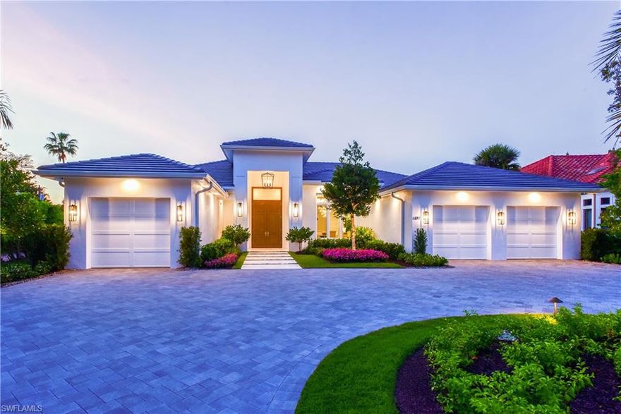 Beautiful NEW CONSTRUCTION single story home located on a oversized lot in the Moorings with SUN ON DECK ALL DAY! This quality home built by D. Roth Construction offers four bedrooms all en-suite plus office/den. Very spacious great-room plan with Inset Grabill Cabinetry in Main Kitchen and Service Kitchen, Inset Sub-Zero/Wolf appliances, Custom Legno Bastone Wide Plank Flooring throughout, and large master His and Her Closets.  Enjoy the outdoor living with over-sized pool deck (mud-set Shell Stone), gas heated pool and spa, gas fireplace, outdoor BBQ grill area and under-counter refrigerator and ice maker serving station.  Three car garage with circular paver drive. Quality finishes throughout make this home a must see. The location is perfect— less than a mile to the private beach with a short drive to Waterside Shops, Mercato Shops, and Historic 5th Avenue!