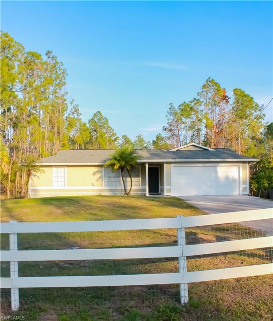 Beautiful & completely upgraded 3 bedroom, 2 bath home on over an acre of land! This home is located in a peaceful and serene setting in Golden Gate Estates. This home features a new roof (2017), new outdoor deck perfect for entertaining (2018), land partially cleared and fenced-in (2018), new water heater (2018), new wood siding (2017), new gutters (2018), freshly painted inside and out (2017), new AC unit (2016), new flooring (2016), and more!  With granite countertops and upgraded Stainless Steel appliances, this home is move-in ready!    Call today to schedule a showing!