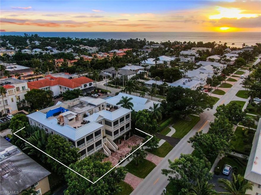 Extremely rare and unique condominium in the revered Rooftops on Fourth, known locally as one of Old Naples' most exclusive buildings. Situated just steps from the renowned 5th Avenue South and the World Famous Gulf beaches, this extraordinary three-bedroom penthouse condominium comes complete with a private and significantly oversized two-car garage and an interior private elevator leading to a spacious private rooftop retreat.  A boutique condominium consisting of only 4 residences, designed by Herscoe Hajjar Architects and constructed by A. Vernon Allen, "Rooftops" sets the standard in luxurious condo living. The residence is elegantly appointed with richly colored custom wood cabinetry, built-ins, and flooring. A thoughtfully designed great room floor plan opens to an additional full-length lanai, perfect for entertaining, affording a level of finish and quality rarely found in Old Naples condos. This is one of the most desirable and rare lifestyle opportunities in the heart of Naples, and it is the PERFECT location for the person who seeks condominium living and the convenience of being steps from the city’s Fifth Avenue South cultural district.