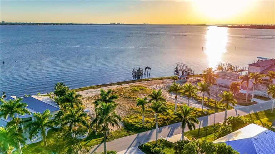 RIVER FRONTAGE LOT SOUTHERN EXPOSURE!!  Gorgeous, oversized lot located directly on the Caloosahatchee River with long range views. Custom Building Plans available to review for this lot. New Seawall in place. Hands Down is one of the best locations with views in Southwest Florida!!!