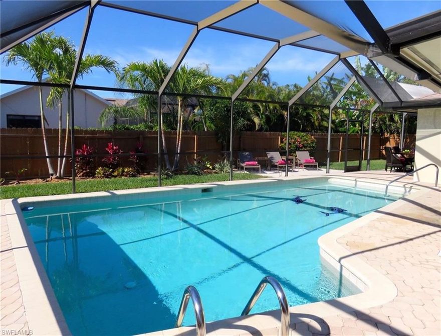 A lovely spacious remodeled and updated Rutenburg built home with modern décor. Inviting screened Lanai/ Pool with fun open Sun Terrace & Barbeque Area all enhanced with privacy fence and tropical plantings. Wood-look laminated and ceramic floors. Granite counters, beautiful baths with exciting tile work. Kitchen Aid Oven, Refrigerator, dishwasher. Hot water heater & A/C 2014.Pool Heater 2016. Manual Shutters. Family room currently used for dining and original dining area used as a sitting room. Short distant from Mackle Park & YMCA for fun activities. Peaceful neighborhood....great for family living, vacationing and/or rental investment