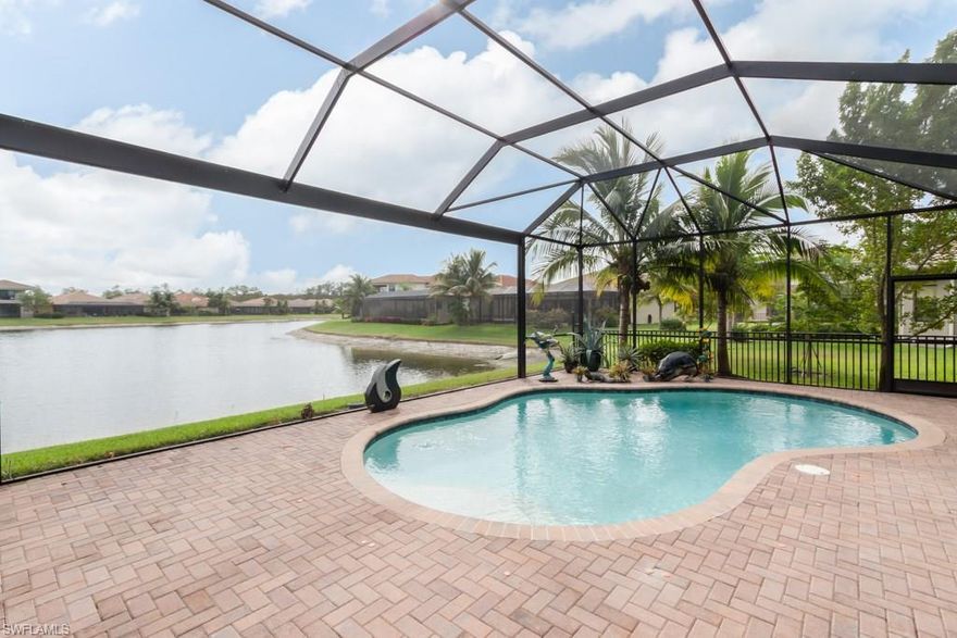 Enjoy superb expansive lake views from highly sought after Carlyle model with pool & large outdoor granite-topped kitchen with built-in BBQ, frig & wet bar. Enter thru double glass doors into a grand foyer with custom tile flooring & tray ceilings. Step[ into a huge great room with custom built-ins, a beautiful gourmet kitchen with gorgeous center Island, separate dining rm with custom moldings, 3 bdrms including a large master suite with beautiful end suite bath, 2 additional full baths as well as a pool bath. A large club room with custom built-ins & a separate laundry rm complete this beautiful home. Located in a luxury gated resort community for all ages, Riverstone, offers unparalleled amenities including a state-of-the-art lifestyle complex w/heated resort-style & lap pools, water play area, indoor basketball/pickle ball court, fully-equipped fitness center w/yoga studio, social room w/catering kitchen and covered patio, outdoor basketball court, tennis courts, playground w/picnic pavilion, & gatehouse with 24/7 security guard. All this & only 10 minutes to gorgeous gulf beaches. Capital contribution for new buyer to HOA $850.00