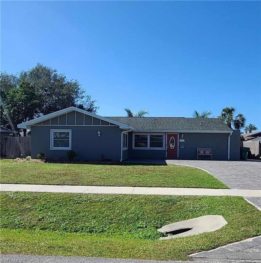 Price Improvement!! Located in the desirable community of Poinciana Village is this upgraded 4BR/2BA pool home.  This meticulously maintained home is tiled throughout with an updated kitchen.  The home has a newer roof, a 2 year young Air Conditioner, most windows and entry door are impact resistant.  For your entertaining needs you have a screen enclosed kidney shaped pool with plenty of travertine deck and enclosed lanai space, a wood fenced in back yard with a fire pit, and a brick paved driveway with plenty of car space.  There is plenty of exterior storage space for your lawn and outdoor equipment.   Centrally located, Poinciana Village has its own community,  childrens playground, tennis and basketball courts, and is close to restaurants, the Coastland Mall, hospitals, all public school grades, and of course the Naples Beaches within 5 miles.  All the luxuries of living in a community with NO HOA FEES!  You heard of Location, Location, well this is it!!