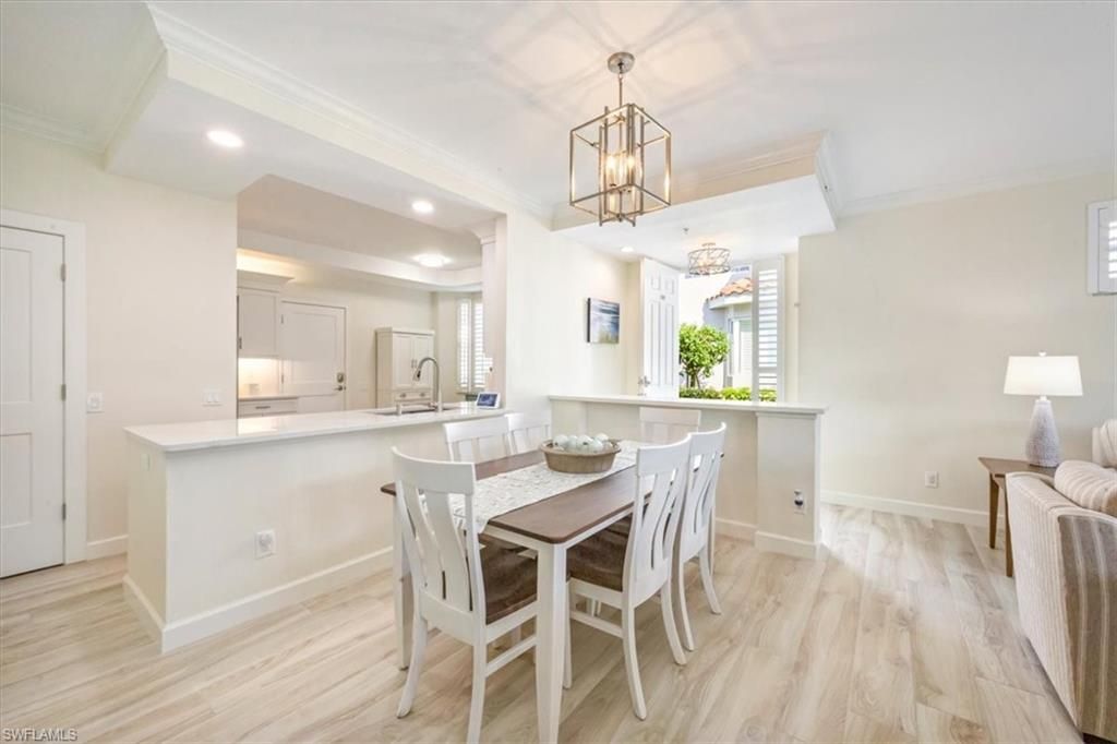 Photo of 500 L Ambiance CIR #101, NAPLES, FL 34108 (MLS # 225083780)