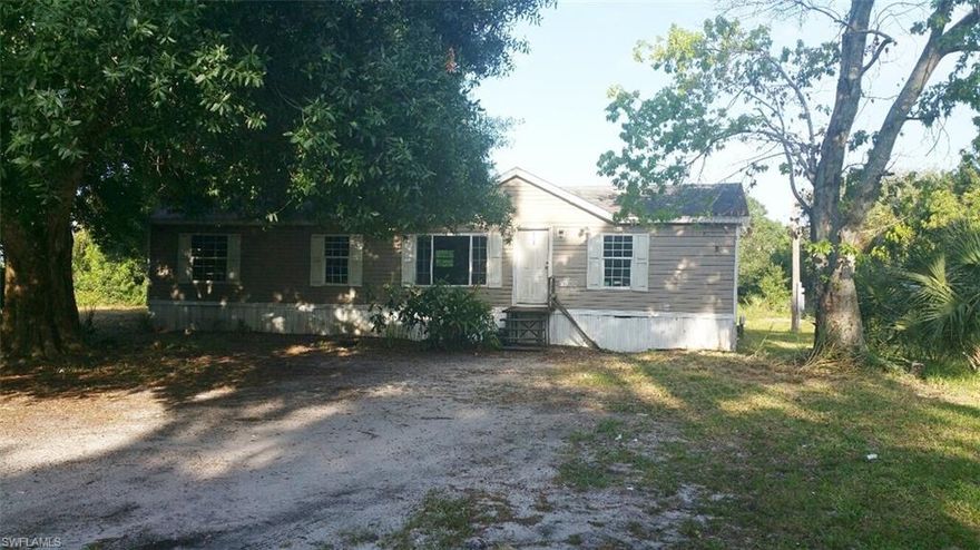 This 3 bedroom, 2 bath home on a 1+/- acre lot is the perfect home for the active family! Located within walking distance to LaBelle's Davis/Pratt sports park, and  near schools, shopping and medical. The home features a split floor plan, a wood burning fireplace and more. (cash offers only, due to condition)