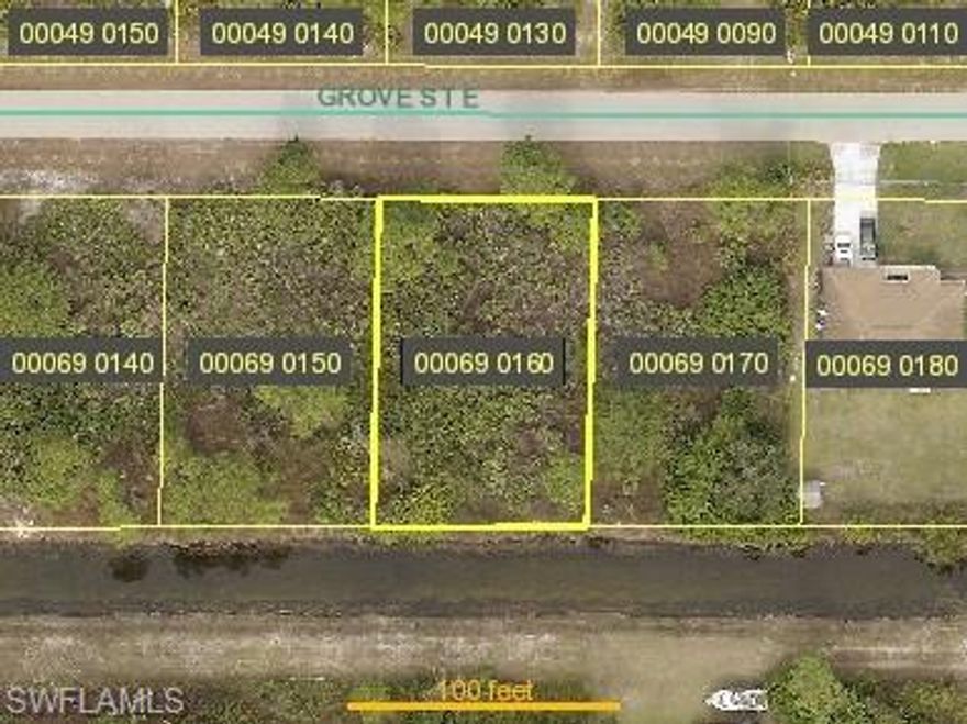 Nice wooded lot with a small freshwater canal in the rear in an established residential neighborhood. Great location for your new home or as an investment.